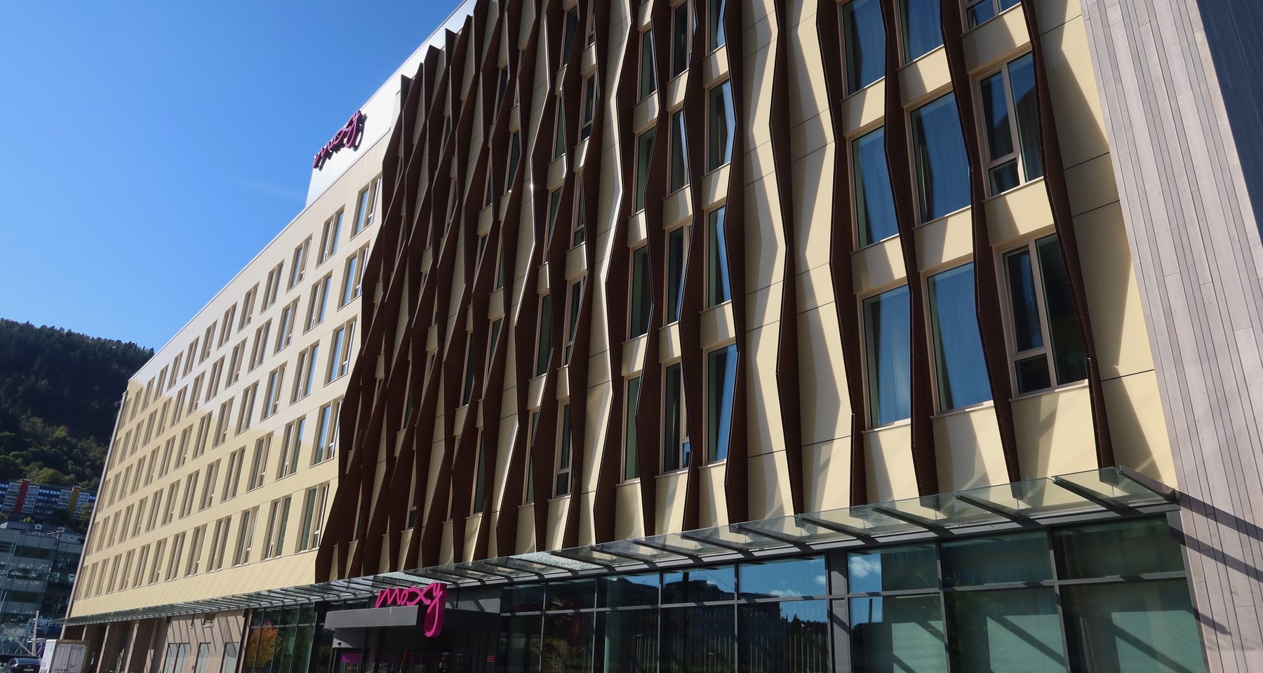 Moxy Hotel Bergen exterior showing the modern hotel facade and entrance near the waterfront in Bergen, Norway