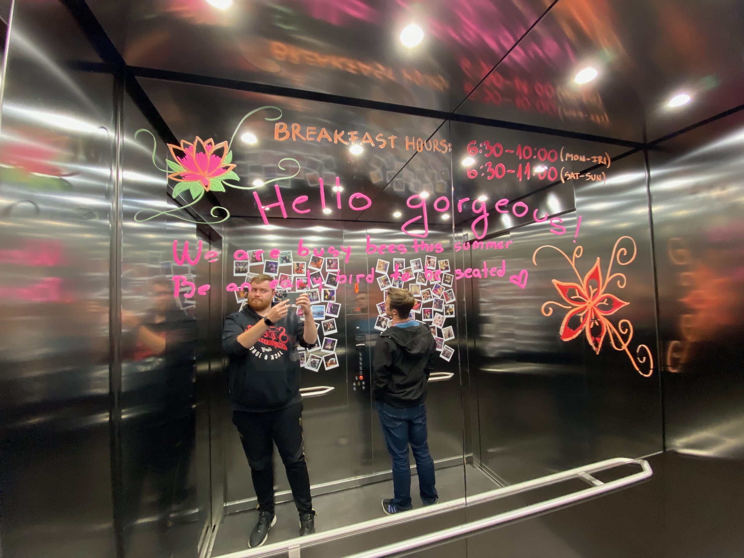 Moxy Hotel Bergen elevator with Timo van den Berg and Peter Smit reflected in the decorated mirror walls