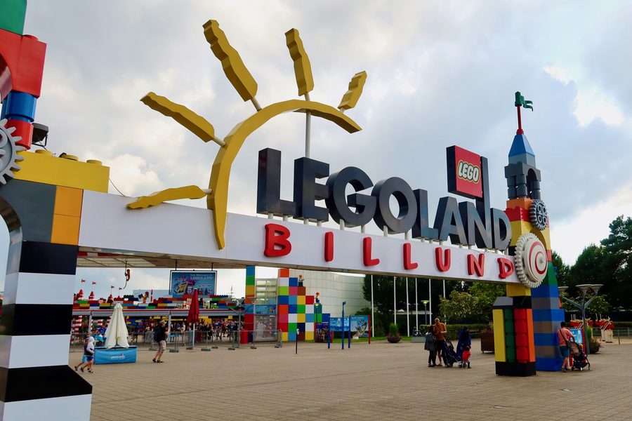 LEGOLAND Billund review IMG 2884 showing the colorful main entrance sign at LEGOLAND Billund in Denmark with LEGO styled towers visitors and the iconic park gate
